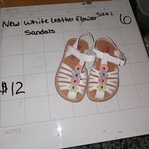 White leather sandals size 6 with flowers
